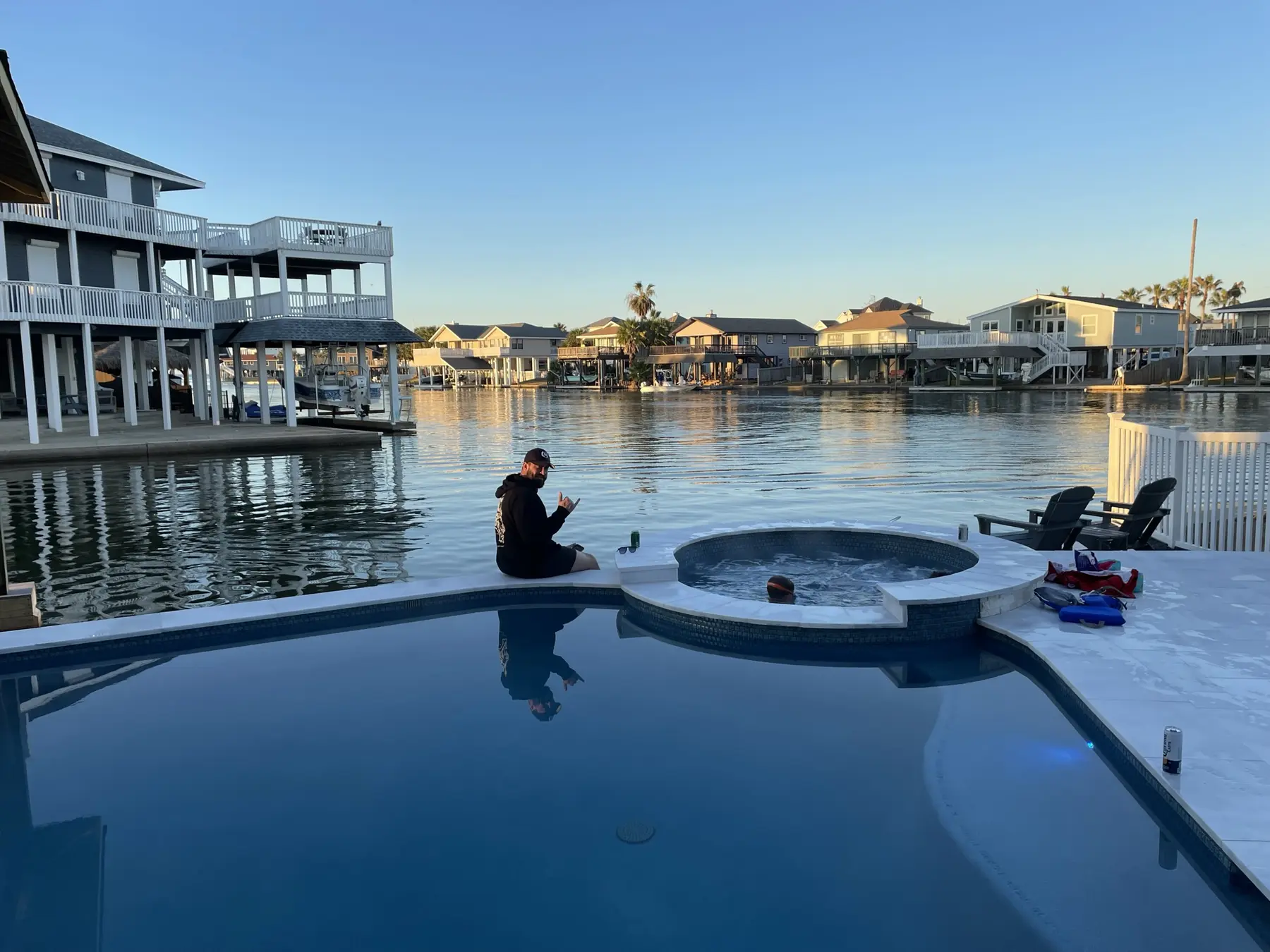 Wide waterfront pool deck at Pelican Lookout